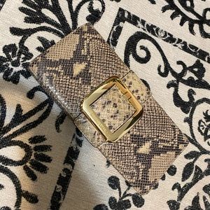 Michael Kors snake skin clutch with buckle
